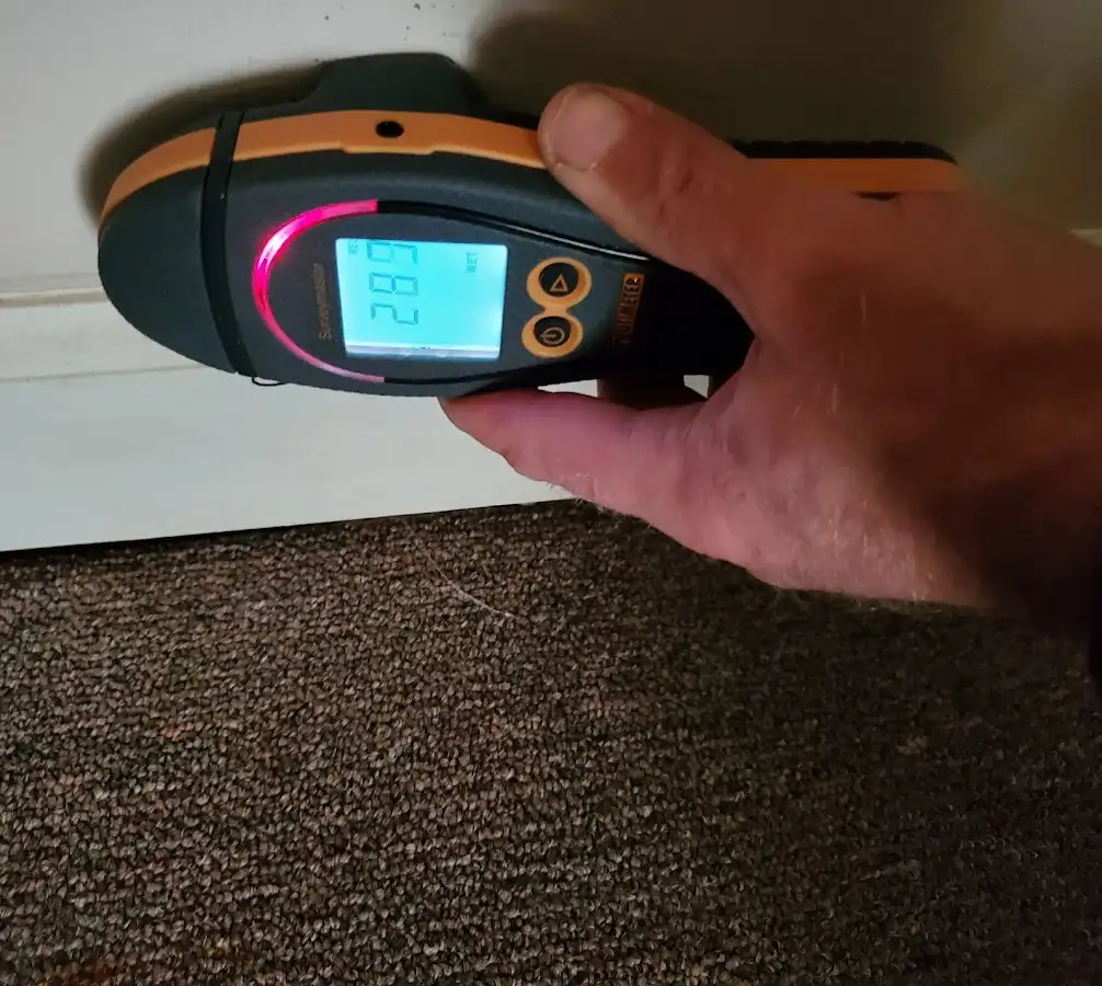 Moisture detection at baseboard during Burst Pipe Cleanup in San Dimas